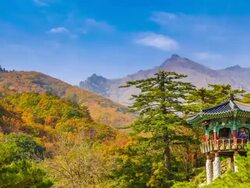 Shot of gazebo at Hwaomsa Temple in Mt. Geumgang and shot of Mt.Seoraksan Stock Footage