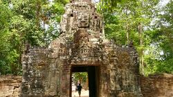 Stone Gate of Angkor Temple at Angkor Thom in Cambodia Stock Footage