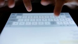 Woman typing a tablet Stock Footage