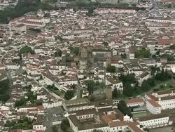 AERIAL WS Townscape with cathedral / Evora, Portugal Stock Footage