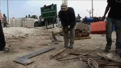 People hoping to escape fighting in port city trapped by shelling News Clip