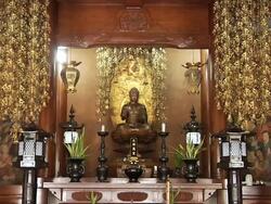 MS Statue of Buddha in temple/ Gaya, Bihar, India Stock Footage