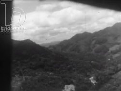 Madagascar c.1958 - Air France plane takes off. Aerial views of forested land. Stock Footage