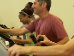 Diverse group running on Ellipticals Stock Footage