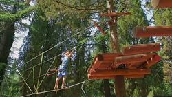 boy in the municipal rope park Stock Footage