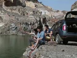 Friends fishing at riverbank, Haryana, India Stock Footage