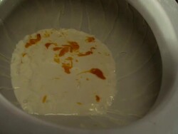 Medium, Locked Down - An egg swirls in a toilet bowl / USA Stock Footage