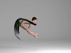 slow motion of ballerina jumping with silk fabric Stock Footage