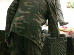 Homeless Man looks for Food in Trash Stock Footage