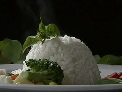 Rice with vegetable on plate Stock Footage