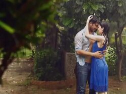 Young couple romancing in rain season, Delhi, India Stock Footage