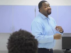 Teacher Interacting with Group of Students Stock Footage