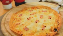 Hawaiian pizza served on a wooden tray Photo Brown. Stock Footage