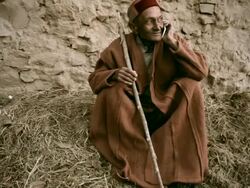 Real people from rural India: Senior Man using mobile phone Stock Footage