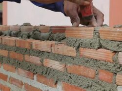 Bricklayers are building a wall Stock Footage