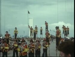 Blankenburg, Belgium, procession in traditional costumes, men on stilts Stock Footage