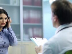 Woman with a headache Stock Footage