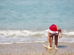 Baby Santa Claus and starfish Stock Footage