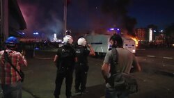 Police and protesters clash as anti-government demonstrations enter 12th night Instructional Video