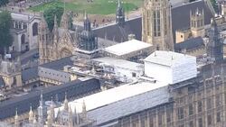 Aerials of Parliament with roof repairs underway News Clip