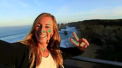 Selfie portrait at sunrise of woman at the Twelve Apostles Stock Footage