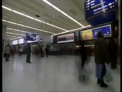 T/L People coming and going from train station, streaky people Stock Footage