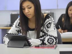 Student uses Digital Tablet Computer in Classroom Stock Footage