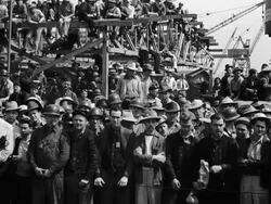 Crowd of workers at shipyard Stock Footage