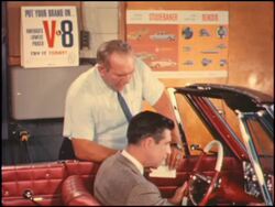 Studebaker service manager talks with customer Stock Footage