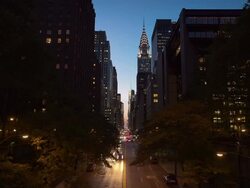 T/L WS LA View of traffic below the Chrysler Building, looking west at dusk Stock Footage