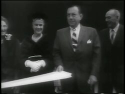 B/W 1959 Mayor Robert Wagner cutting ribbon at Guggenheim Museum dedication / NYC Stock Footage