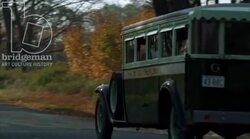 Car driving through the countryside, 1930s - reenactment, clip 3 Stock Footage