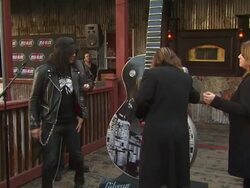 Slash (L) and Ozzy Osbourne at the Ozzy Osbourne Signs a 10-Foot Guitar at The House Of Blues at Hollywood CA. (Footage by WireImage Video/GettyImages) Stock Footage