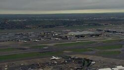 Aerials of planes landing at Heathrow Airport News Clip