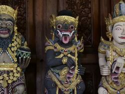 MS Old wood carving god like figure at temple guardian / Ubud, Bali, Indonesia Stock Footage