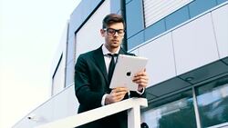 Using tablet outside of work Stock Footage