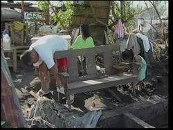 Aftermath of Typhoon Durian, residents return to buried village News Clip