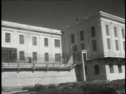 Guards in towers keep watch over Alcatraz. News Clip