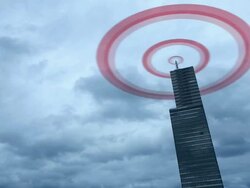 WS T/L View of antenna on skyscraper emitting radiation /Cologne, North Rhine-Westphalia, Germany  Stock Footage