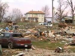 MS POV ZI ZO Shot of destroyed neighborhood moments after tornado / Woodward, Iowa, United States Stock Footage
