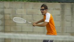 Tennis player practicing returning serves. - Slow Motion Stock Footage