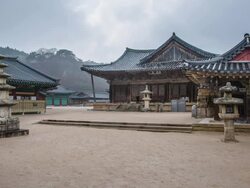 WS T/L Landscape of Tongdosa in rain (One of Three Jewel Temples of Korea) with spectator / Yangsan, Gyeongsangnamdo, South Korea Stock Footage