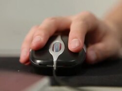 CU R/F Hand handling mouse / Sao Paulo, Brazil Stock Footage