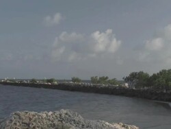 Evening sky over the small bay tl Stock Footage