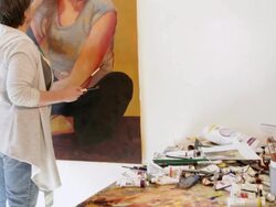 MS TU Woman artist painting portrait in her studio / Lamy, New Mexico, United States Stock Footage