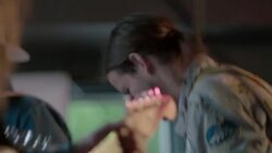 Two musicians rock out on electric guitars with band in Austin bar Stock Footage