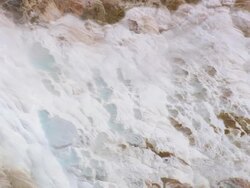 CU AERIAL Shot of steam coming through Mammoth Springs / Wyoming, United States Stock Footage