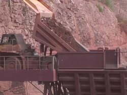 WS  Truck duming stone in crusher  / Taben-Rodt, North Rhine- Westphalia, Germany Stock Footage