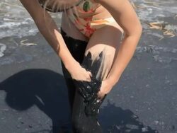 CLIP Young woman have mud therapy outdoors summer Stock Footage