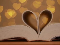 love story, page made heart shape with heart facula background Stock Footage